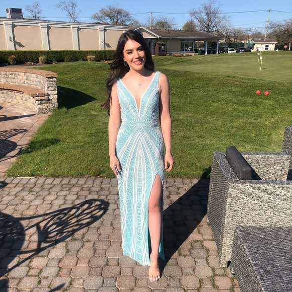 Blue beaded Prom dress worn once in good condition.
